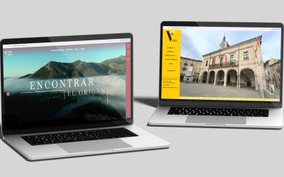 Dos ordenadores sobre fondo gris